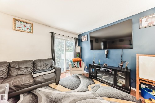 38-150 Edwards Drive Sw, Edmonton, AB - Indoor Photo Showing Living Room