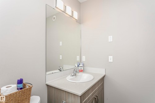 Half bathroom with vanity and toilet - 2855 16 Avenue, Edmonton, AB - Indoor Photo Showing Bathroom
