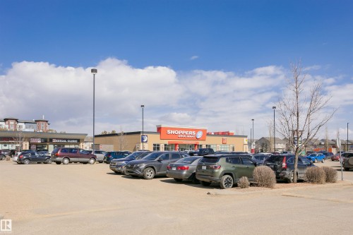 View of uncovered parking lot - 2855 16 Avenue, Edmonton, AB - Outdoor