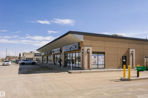 View of commercial location with uncovered parking - 2855 16 Avenue, Edmonton, AB - Outdoor