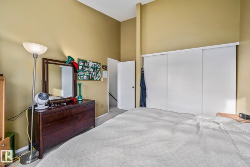 Bedroom featuring a high ceiling, carpet, and a closet - 11 Grandview Ridge, St. Albert, AB - Indoor