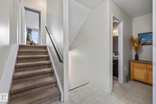 Stairs with baseboards - 11 Grandview Ridge, St. Albert, AB - Indoor Photo Showing Other Room