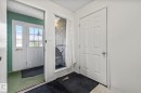 Entryway with a fireplace - 11 Grandview Ridge, St. Albert, AB  - Indoor Photo Showing Other Room 