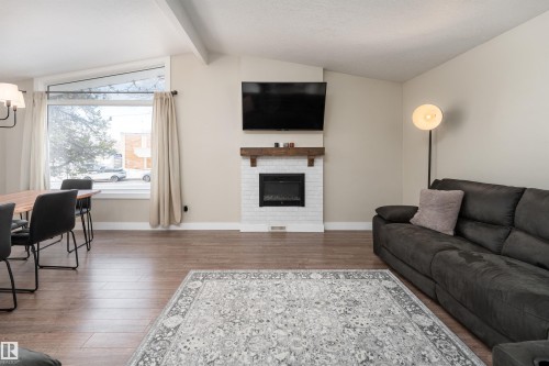 73 Grosvenor Boulevard, St. Albert, AB - Indoor Photo Showing Living Room With Fireplace