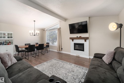 73 Grosvenor Boulevard, St. Albert, AB - Indoor Photo Showing Living Room With Fireplace