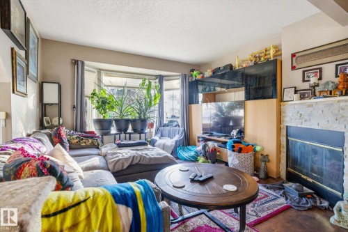 9771 176 Street, Edmonton, AB - Indoor Photo Showing Living Room With Fireplace
