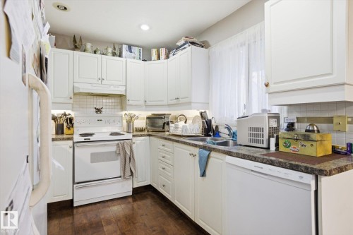 9771 176 Street, Edmonton, AB - Indoor Photo Showing Kitchen With Double Sink