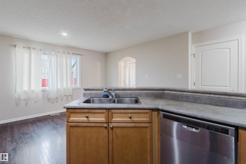 1124 37A Avenue, Edmonton, AB - Indoor Photo Showing Kitchen With Double Sink