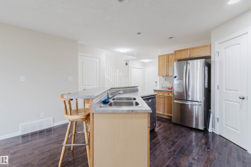 1124 37A Avenue, Edmonton, AB - Indoor Photo Showing Kitchen With Double Sink