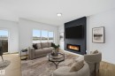 15 Gable Common, Spruce Grove, AB  - Indoor Photo Showing Living Room With Fireplace 