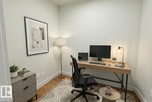 Office space with wood finished floors and baseboards - 3704 10360 102 Street, Edmonton, AB - Indoor Photo Showing Office