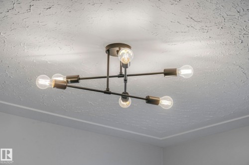 Detailed view of a textured ceiling - 6007 95 Avenue, Edmonton, AB - Indoor Photo Showing Other Room