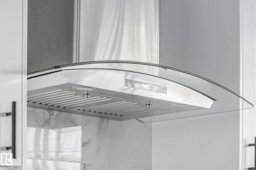 Detailed view of extractor fan - 6007 95 Avenue, Edmonton, AB - Indoor Photo Showing Other Room
