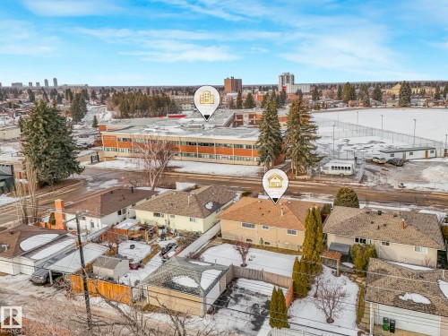 Snowy aerial view featuring a city view - 6007 95 Avenue, Edmonton, AB - Outdoor With View