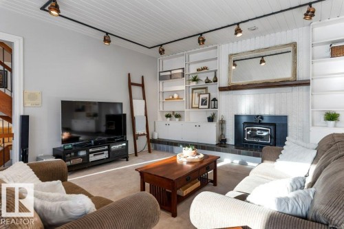 32 Grenfell Avenue, St. Albert, AB - Indoor Photo Showing Living Room With Fireplace