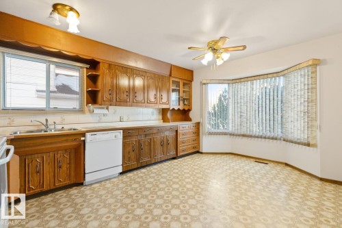 4835 115 Avenue, Edmonton, AB - Indoor Photo Showing Kitchen With Double Sink