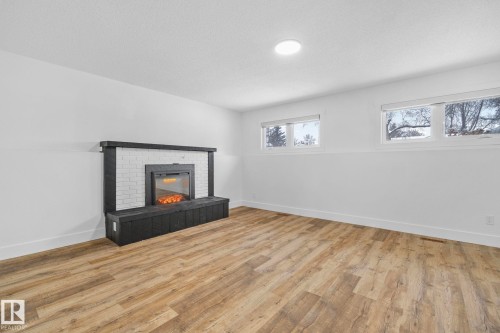 16 Larose Drive, St. Albert, AB - Indoor Photo Showing Living Room With Fireplace