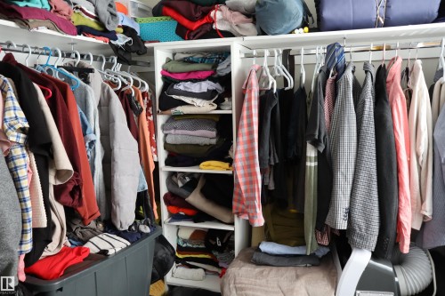 View of walk in closet - 9760 - 107 Street, Westlock, AB - Indoor With Storage