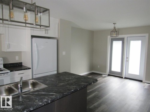 9760 - 107 Street, Westlock, AB - Indoor Photo Showing Kitchen With Double Sink