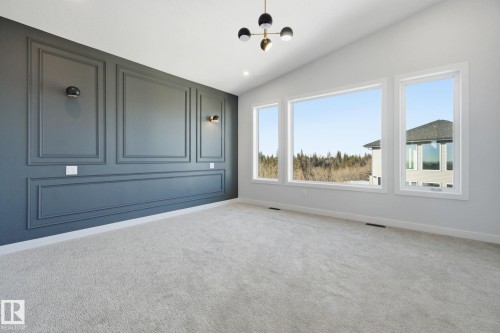Empty room featuring light carpet, lofted ceiling, and recessed lighting - 17108 2 Street, Edmonton, AB -  Photo Showing Other Room