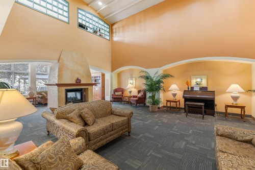 402 78 Mckenney Avenue, St. Albert, AB - Indoor Photo Showing Living Room With Fireplace