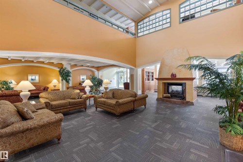 402 78 Mckenney Avenue, St. Albert, AB - Indoor Photo Showing Other Room With Fireplace