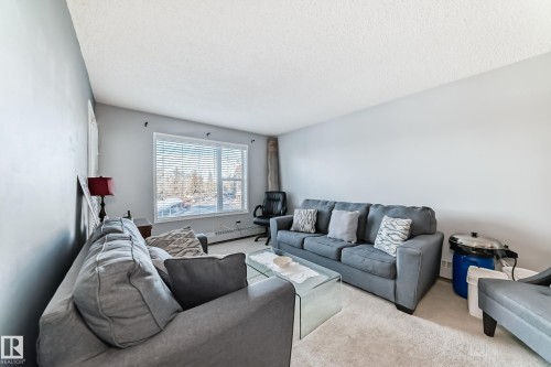 347 10520 120 Street, Edmonton, AB - Indoor Photo Showing Living Room