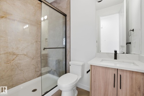 Full bath featuring a stall shower and vanity - 17107 3 Street, Edmonton, AB - Indoor Photo Showing Bathroom