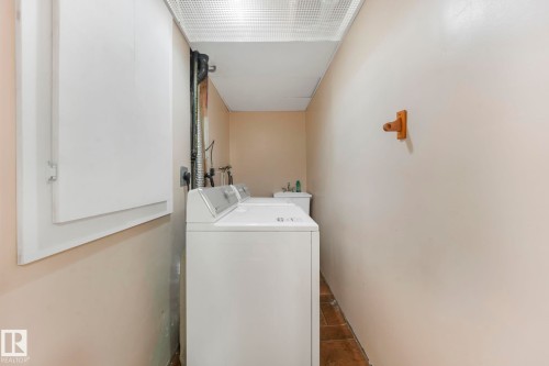 Laundry room with independent washer and dryer - 19 1415 62 Street, Edmonton, AB - Indoor Photo Showing Laundry Room