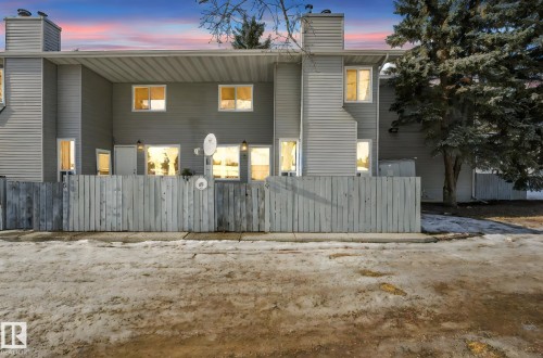 Back of house at dusk with a chimney - 19 1415 62 Street, Edmonton, AB - Outdoor