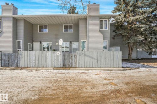 Rear view of house with a chimney - 19 1415 62 Street, Edmonton, AB - Outdoor