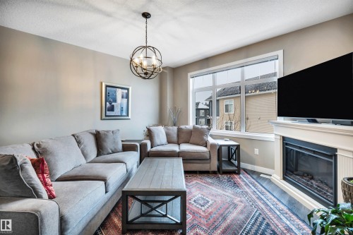 87 600 Bellerose Drive, St. Albert, AB - Indoor Photo Showing Living Room With Fireplace