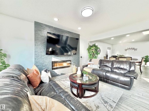 1636 14 Street, Edmonton, AB - Indoor Photo Showing Living Room With Fireplace
