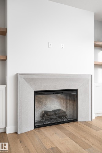 6884 Knox Loop Sw, Edmonton, AB - Indoor Photo Showing Living Room With Fireplace