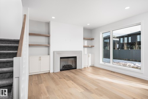 6884 Knox Loop Sw, Edmonton, AB - Indoor With Fireplace