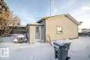 Snow covered rear of property featuring stucco siding - 5138 47 Ave, St. Paul Town, AB  - Outdoor With Exterior 