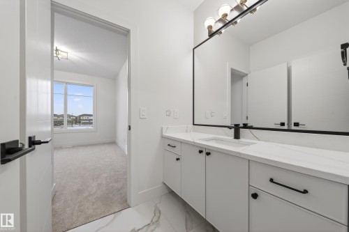 Snowy aerial view with a residential view - 8924 Mayday Way, Edmonton, AB - Outdoor With View