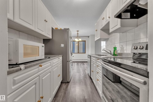 407 9725 106 Street, Edmonton, AB - Indoor Photo Showing Kitchen With Upgraded Kitchen
