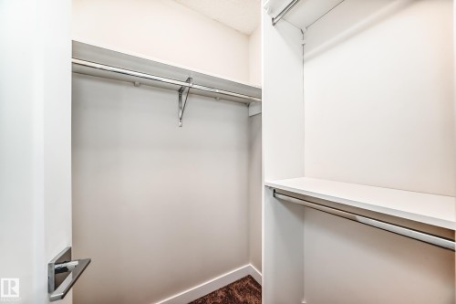 View of walk in closet - 17926 62A Street, Edmonton, AB - Indoor With Storage