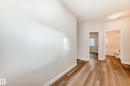 Unfurnished bedroom with light wood-style flooring and ensuite bath - 17926 62A Street, Edmonton, AB  - Indoor Photo Showing Other Room 