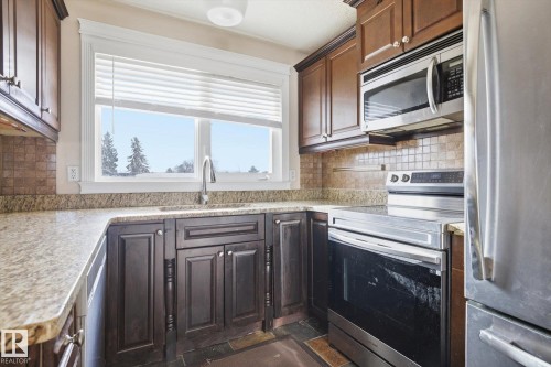 7807 145 Avenue, Edmonton, AB - Indoor Photo Showing Kitchen With Upgraded Kitchen