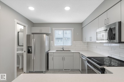 14 1110 Daniels Link Link, Edmonton, AB - Indoor Photo Showing Kitchen With Upgraded Kitchen