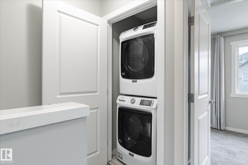14 1110 Daniels Link Link, Edmonton, AB - Indoor Photo Showing Laundry Room