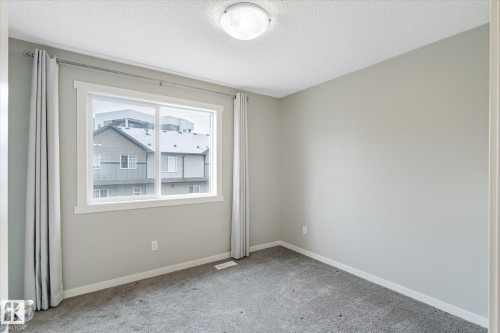 14 1110 Daniels Link Link, Edmonton, AB - Indoor Photo Showing Other Room