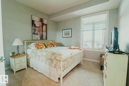 Guest Bedroom - 301 625 Leger Way Nw, Edmonton, AB - Indoor Photo Showing Bedroom