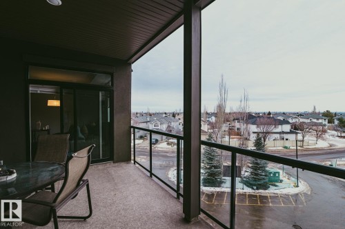 Balcony with outdoor dining area and sunny unobstructed views. - 301 625 Leger Way Nw, Edmonton, AB - Outdoor With Exterior
