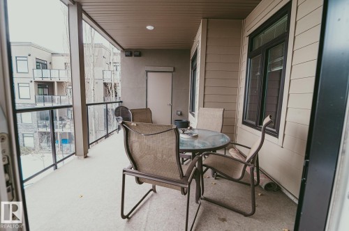Balcony with outdoor dining space - 301 625 Leger Way Nw, Edmonton, AB - Outdoor With Deck Patio Veranda With Exterior