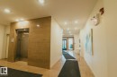 Hallway featuring elevator and recessed lighting - 301 625 Leger Way Nw, Edmonton, AB  - Indoor Photo Showing Other Room 