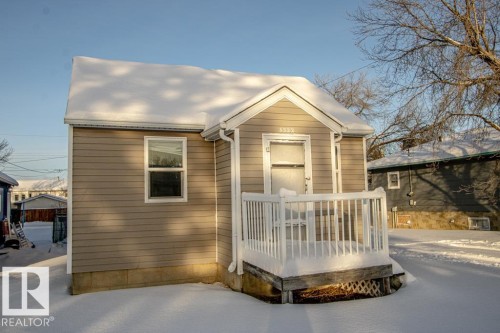View of front of property featuring a wooden deck - 5322 52 Ave, St. Paul Town, AB - Outdoor