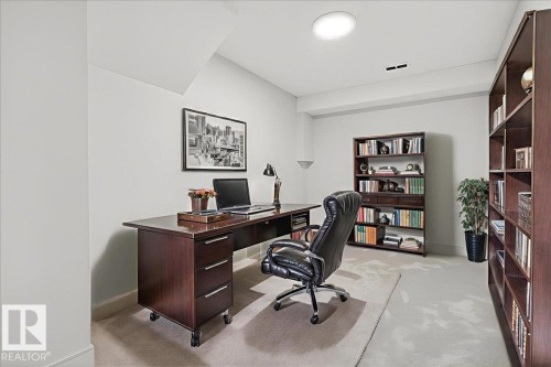 Office area with light carpet and baseboards - 218 Omand Drive, Edmonton, AB 